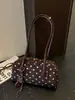 Bolsa de almofada de bolinhas de alta qualidade e estilosa para mulheres, nova bolsa de boliche retrô de nicho, bolsa de ombro sob o braço, moderna