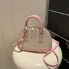 Parche Tejido 2026 Primavera Nueva Moda Tendencia Simple Versátil Bolso de Hombro Cruzado Bolso de Concha