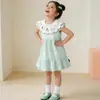 Verano 2026 Nuevo Vestido de Pastel Bordado Color Menta Dopamina Cuello de Muñeca Vestido para Niñas Ropa Infantil Al por Mayor