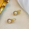 Estilo francés exquisito retro hueco forma de gota perla gancho para oreja elegante lujo ligero alta calidad estilo frío aretes aretes para mujer