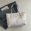2025 Inverno Novo Estilo Listrado Moda Casual Grande Capacidade Bolsa Tote Estilo Fresco Elegante Comutação Ombro Axila Bolsa Feminina