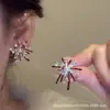 Pendientes de Fuegos Artificiales de Circonita Roja 2026 Pendientes Populares Nuevos Únicos de Gama Alta de Nicho Pendientes Exquisitos para Otoño e Invierno