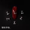 Personalidade explosiva transfronteiriça 26 letras joias de liga letras prateadas japonesas da internet vermelha joias para unhas broca de unhas atacado