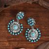 Pendientes de turquesa estilo étnico retro bohemio transfronterizo europeo y americano con personalidad femenina y diseño floral exagerado.