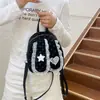Mochila de conejo de orejas caídas con lunares de encaje dulce estilo coreano, femenina y elegante, mochila pequeña de moda de alta apariencia para el día a día