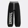 Pantalones de chándal jogger personalizados con efecto desgastado para hombre, con un atrevido diseño de estampado de espuma. Pantalones de chándal para hombre, modernos y de corte holgado