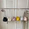 Bolso cubo único de cordón de nicho 2026 nuevo bolso cruzado versátil de moda para mujer bolso nube súper popular exquisito