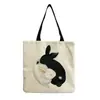 Directo de fábrica estilo coreano bolso de hombro práctico de dibujos animados moda versátil bolsa de mano lindo gato estampado bolsa de compras