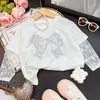 Nova Camiseta Infantil de Manga Longa para Primavera Laço Strass Hot Roupas Infantis Camiseta para Meninas Renda Falso Conjunto Duas Peças Top