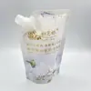 Venta al por mayor de fábrica de todo tipo de capacidad, forma especial, 1000ML, bolsa con boquilla de succión para aceite de coco, detergente para ropa, planta auto-soportante
