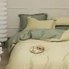 Juego de ropa de cama de cuatro piezas de algodón de fibra larga de Xinjiang, color liso, que incluye una funda de edredón de satén de algodón puro, sábana plana y sábana bajera, adecuado para todas las estaciones.