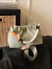 Bolsa de Ombro Única em Tecido de Nylon para Outono Inicial Transfronteiriça 2025 Novo Design de Nicho Bolsa Transversal Casual para Passeios