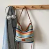 Bolso Tejido de Moda con Bloques de Color para Mujer 2026 Primavera Nuevo Estilo Ins Simple Casual Bolso Cubo Elegante Bolso de Hombro