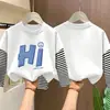Camiseta de manga larga para niño 2026 nueva ropa de otoño para niños, camiseta básica de algodón puro de imitación de dos piezas para niño, top para niños mayores
