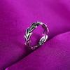 Anillo de plata tailandés con hojas huecas retro de estilo nacional de moda europea y americana, diseño antiguo teñido a mano en negro, una generación de cabello