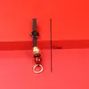 Se puede hacer tú mismo con cuerda roja creativa, cinco monedas de emperador, accesorios semiacabados para llaveros, accesorios para bolsos, colgante para coche, generación