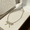 Collar de Perlas con Lazo para Mujer 2025 Nuevo Cadena para Clavícula de Gama Alta Súper Hada Elegante Gargantilla Accesorios