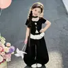 Conjunto de Verano para Niñas 2026 Nueva Moda Infantil Top de Encaje con Retazos Pantalones Anchos Holgados Conjunto de Dos Piezas