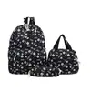 Nova Bolsa de Ombro Duplo com Estampa de Flores Borboleta Transfronteiriça Feminina Estudante Bolsa Escolar Mochila Campus Fresca Doce Conjunto de Três Peças