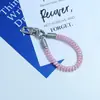 Huayang Macaron Cordón de Teléfono Colorido Correa de Muñeca Anti-Pérdida de Gama Alta Llavero Colgante para Bolsa Venta al por Mayor