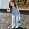 Conjunto de Niña Verano 2026 Nuevo Elegante Moderno Cuello Polo Conjunto de Verano Pantalones de Pierna Ancha a Cuadros Conjunto de Dos Piezas