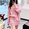 Conjunto de cardigã de tricô rosa doce e jovem e saia estilo francês para mulheres, outono e inverno, design estiloso, conjunto de duas peças que afina