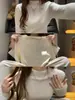 Suéter Versátil de Cor Sólida com Gola Alta Curta para Mulheres Outono e Inverno 2025 Estilo Coreano Slimming Look Camisa Básica de Tricô para Usar por Baixo Top
