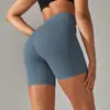 Pantalones de yoga de estilo nuevo sin línea de vergüenza color piel para mujer, cintura alta, realce de glúteos, compresión abdominal, shorts deportivos de tres puntos