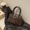 Bolsa de Ombro Transversal Estilo Americano Retro 2024 Design de Nicho Simples para o Dia a Dia Bolsa de Mão Moderna