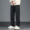 Calças masculinas com múltiplos bolsos, calças casuais de trabalho modernas de tamanho grande, calças casuais largas, novas calças retas para primavera e outono