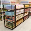 Estantería de supermercado Hu Shuo, estantería de exhibición, tienda de conveniencia, estantería de refrigerios de un solo lado, papelería materna e infantil, gabinete de isla central de múltiples capas, venta al por mayor