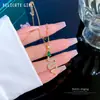 [Acero de Titanio] Lujo Ligero Serpiente de Ojos Verdes Microincrustada Cadena de Clavícula para Mujer con Cuentas de Transferencia Celebridad de Ins Cyber Accesorios