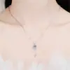 Yihua disco geométrico totalmente chapado en diamante 18k colgante de llave colgante con forma de llave de temperamento cadena para la clavícula al por mayor
