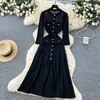 Vestido Tricô Feminino 2025 Outono Novo Francês Semi-Transparente com Recortes Gola Redonda Cintura Alta Slim Manga Longa Bolso Duplo com Aba