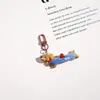 Novo Pingente Chaveiro Dachshund Desenho Animado Fofo Pingente de Bolsa Pequeno Presente Carro Mochila Escolar Little Red Book