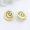 Pendientes retro de estilo británico de nicho con personalidad, diseño geométrico hueco, elegantes clips para orejas redondos con ondas de agua para mujer