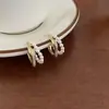 Pendientes de botón de alta gama estilo Chanel, con forma de C, circonita y perla, para uso diario