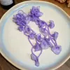 Flor de chifre com agulha de prata Flor com contas Laço de flor Brincos com borla redonda Brincos de tarraxa versáteis e elegantes Brincos de nicho de luxo leve