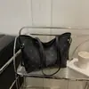 Bolso Tote de Hombro de Gran Capacidad Estilo de Nicho de Gama Alta Moda Otoño 2026 Versátil y Elegante para el Trabajo