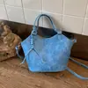 Moda de alta calidad transfronteriza primavera 2026 nuevo diseño de nicho bolso de mujer bolso de hombro cruzado simple