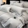 Estilo de lujo ligero conjunto de cuatro piezas de algodón 100S bordado de algodón de fibra larga de Xinjiang, funda de edredón bordada de alta gama de algodón puro, sábana, juego de ropa de cama