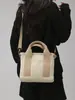 Bolso de lona de comercio exterior nuevo con gran capacidad y múltiples compartimentos, bolso de mano cruzado versátil y casual para el día a día y bolso de hombro para mujer