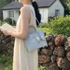 Bolso pequeño texturizado 2026 transfronterizo nuevo moda nicho bolso de mano bolso cesta con lazo elegante bolso cruzado de viaje