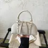 Bolso de hombro tipo concha liso para mujer, nuevo bolso de moda para mujer con un diseño elegante y único, bolso cruzado