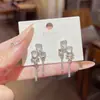 Pendientes de Plata S925 Corea del Sur Lujo Ligero Nicho Piedra Ojo de Gato Amor Pendientes Versátiles de Alta Gama Pendientes de Moda Elegantes para Mujeres