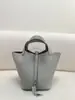 2025 Nova Bolsa Cesta de Couro TC de Alto Padrão com Ferragens de Aço Costurada Semi-Manual com Linha Encerada Bolsa Tote Versátil