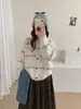 Chaqueta suéter de punto a rayas de color contrastante con cuello en V estilo coreano, nuevo cárdigan de punto versátil de ajuste holgado para mujer, otoño e invierno 2026