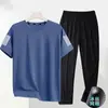 [Entrega Rápida] Roupa Esportiva Masculina de Verão Respirável Casual com Absorção de Umidade Calças de Manga Curta Conjunto de Duas Peças Seda Gelo