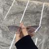 2025 gafas de sol triangulares nuevas transfronterizas Amazon sentido del diseño de caja pequeña gafas de sol metálicas para hombres y mujeres gafas de pasarela
