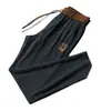 Nuevos pantalones casuales rectos de pana para hombre de comercio exterior, otoño e invierno, engrosados, con forro polar, holgados y resistentes al frío